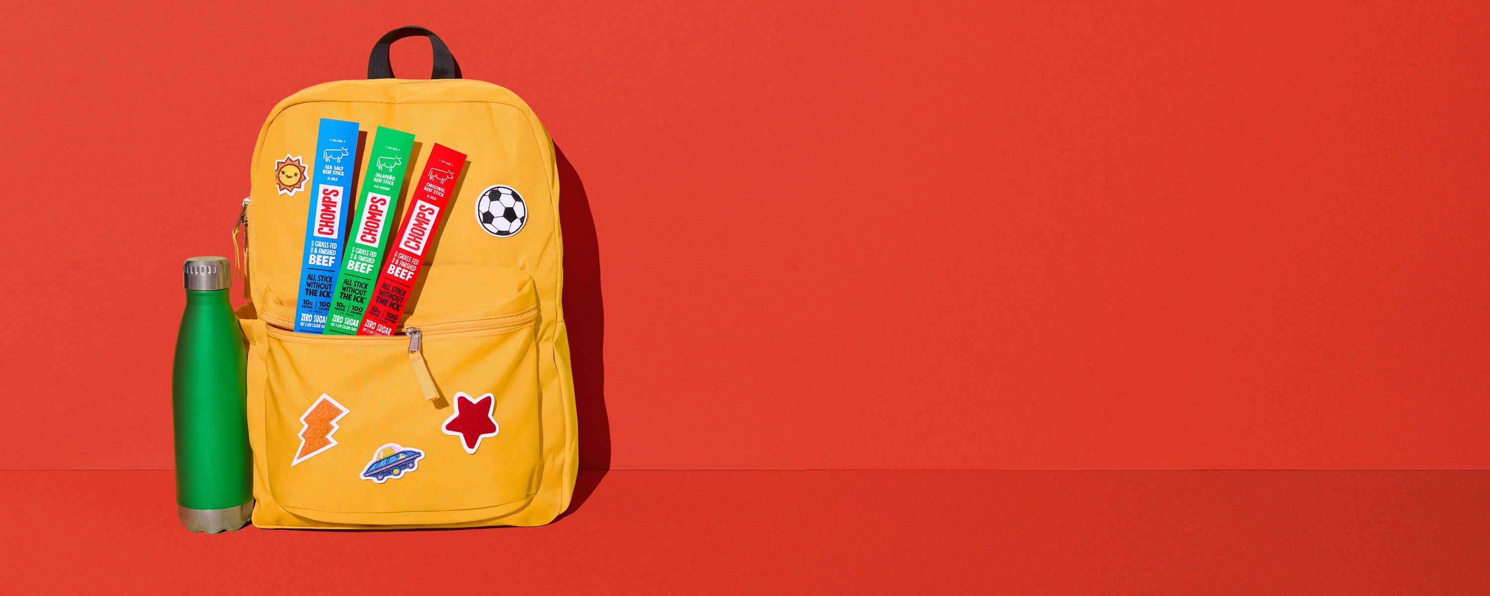 Stock up on the perfect snack for going back to school – a picture of Chomps in a backpack.