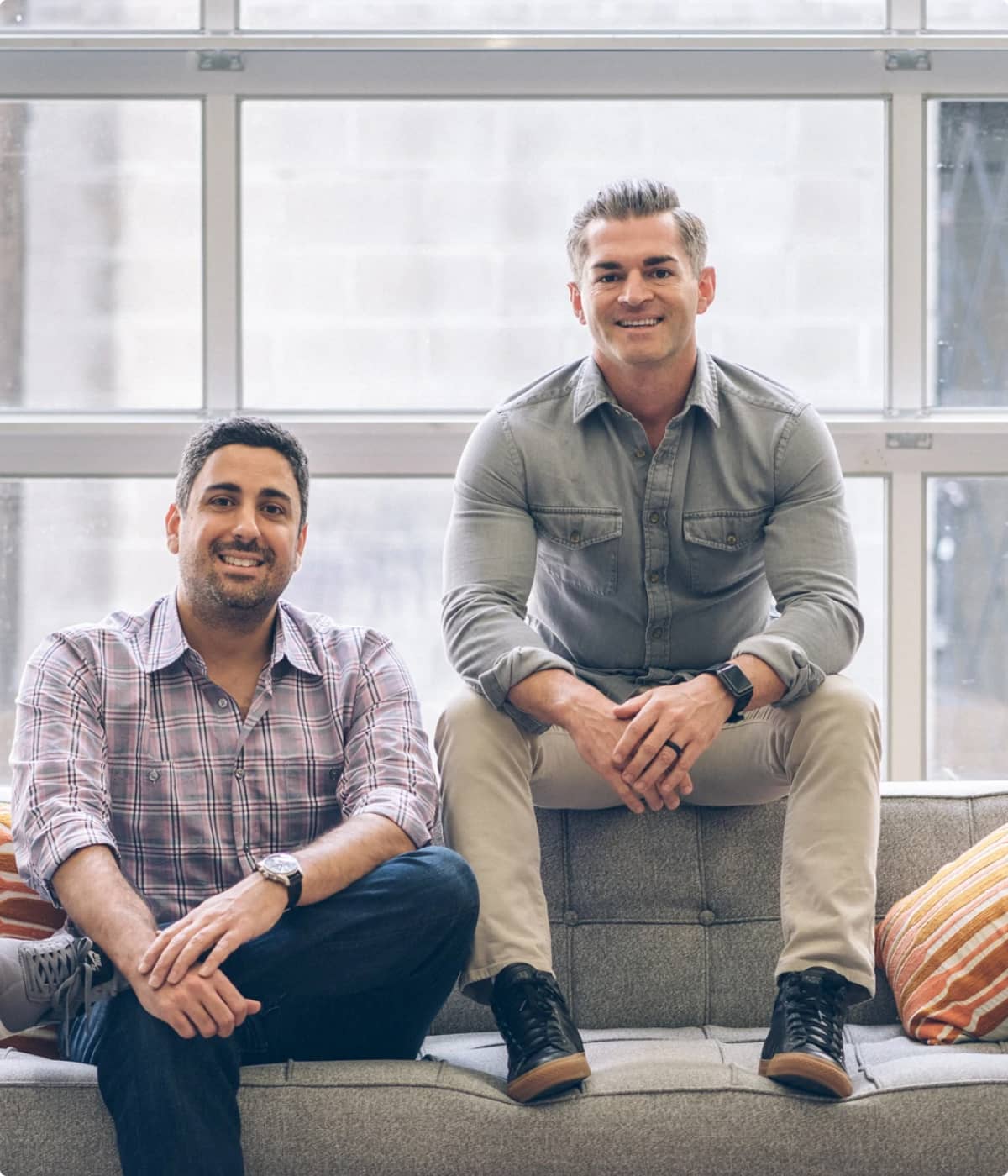 Chomps founders Pete Maldonado and Rashid Ali sitting together