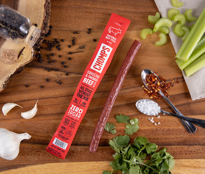 An original beef Chomps sitting beside it's ingredients