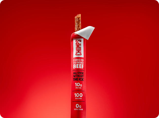 A single Chomp's Original beef stick snack shown upright on a red background